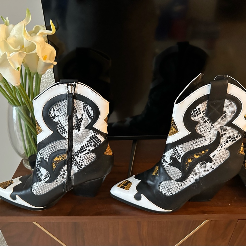 Snake pointed toe boots